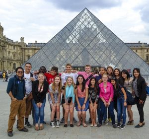 Study in France to improve your French language skills through classes and cultural immersion. Visit the world’s most celebrated art museums in Paris and go on a quest to capture the city’s charm under the guidance of a French photographer. There is no better way to study abroad in France! Students in front of one of the glass pyramids of The Louvre