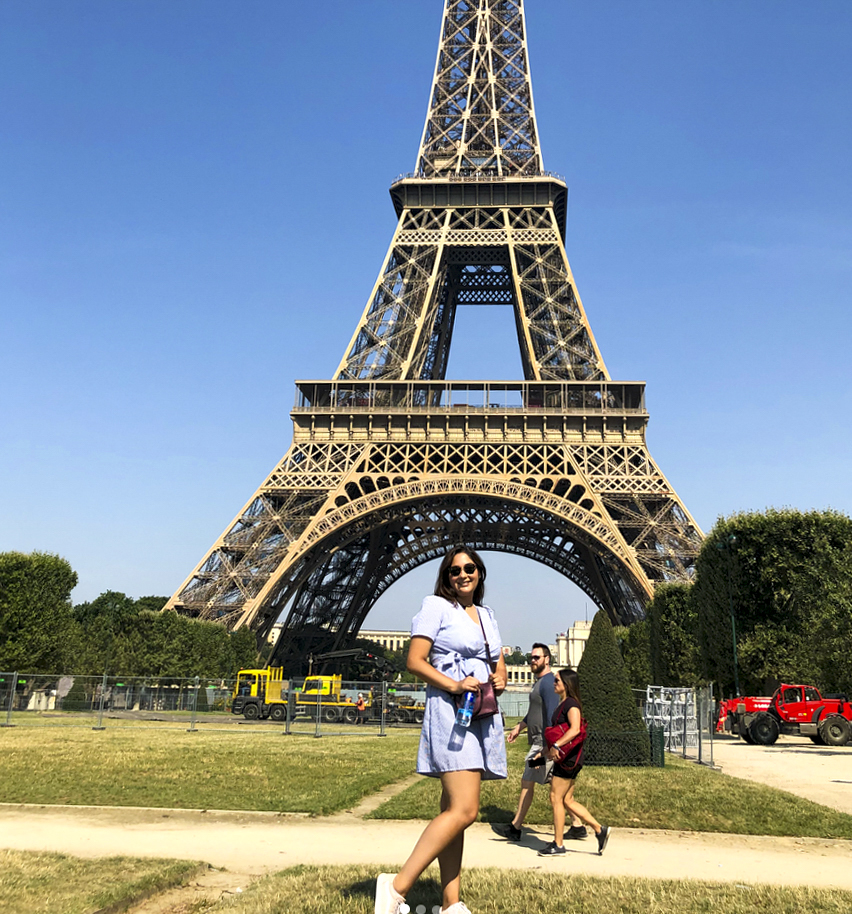 Study abroad in France with The Experiment to discover its diverse cultures and regions—from Paris to a border community and its neighboring country. High school study abroad in Europe with The Experiment in International Living. Student in front of the Eiffel Tower