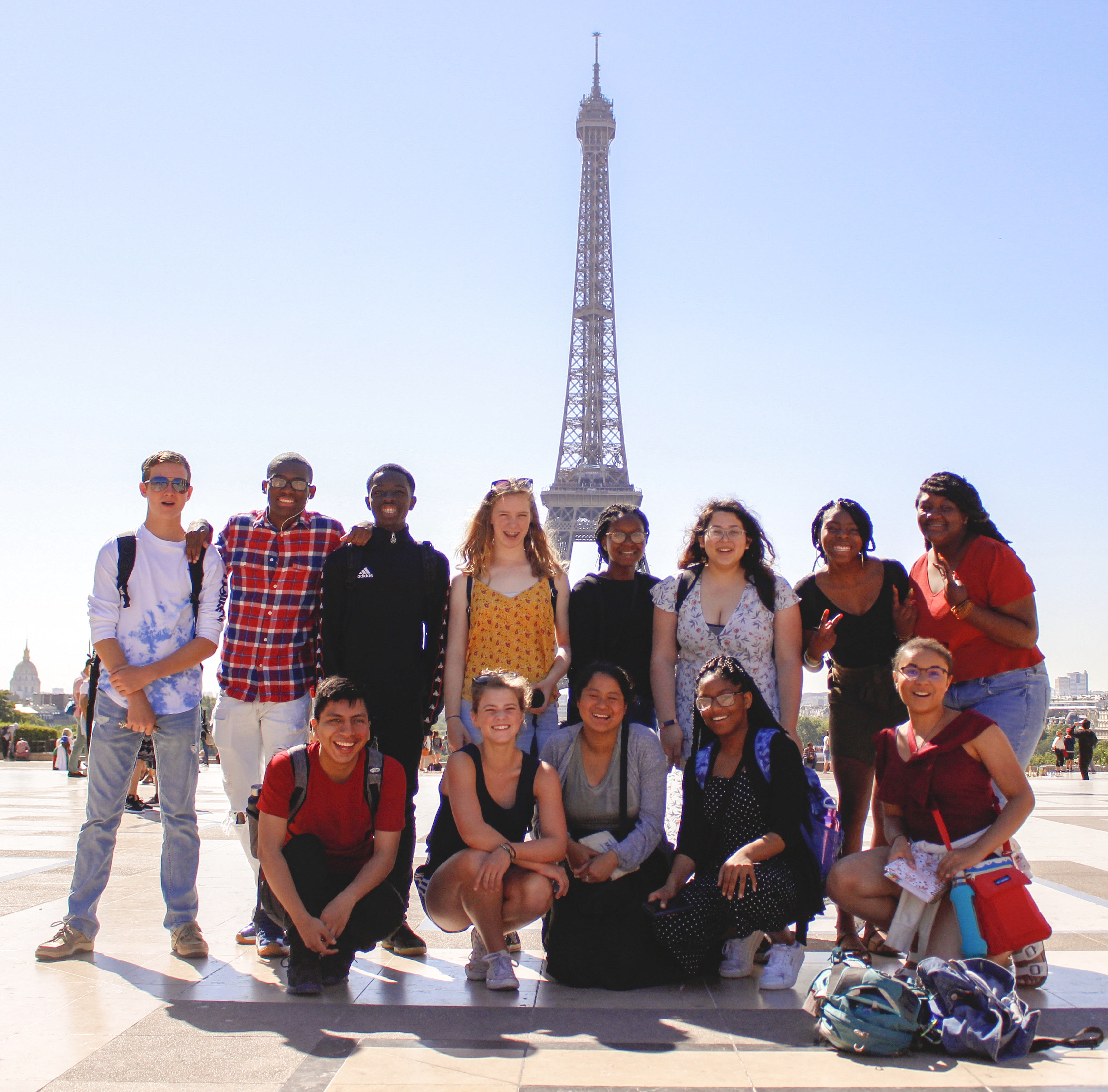 Study abroad in France with The Experiment to discover its diverse cultures and regions—from Paris to a border community and its neighboring country. High school study abroad in Europe with The Experiment in International Living. Students in front of the Eiffel Tower